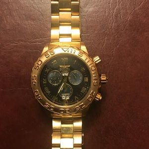 Men’s Invicta Gold watch